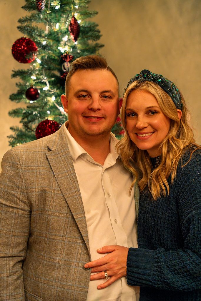 Couple by a Christmas tree